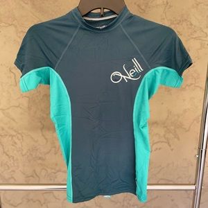 Never worn women’s O’Neill teal rash guard (Size: Medium)